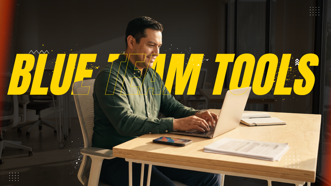 A man working on computer with blue team tools